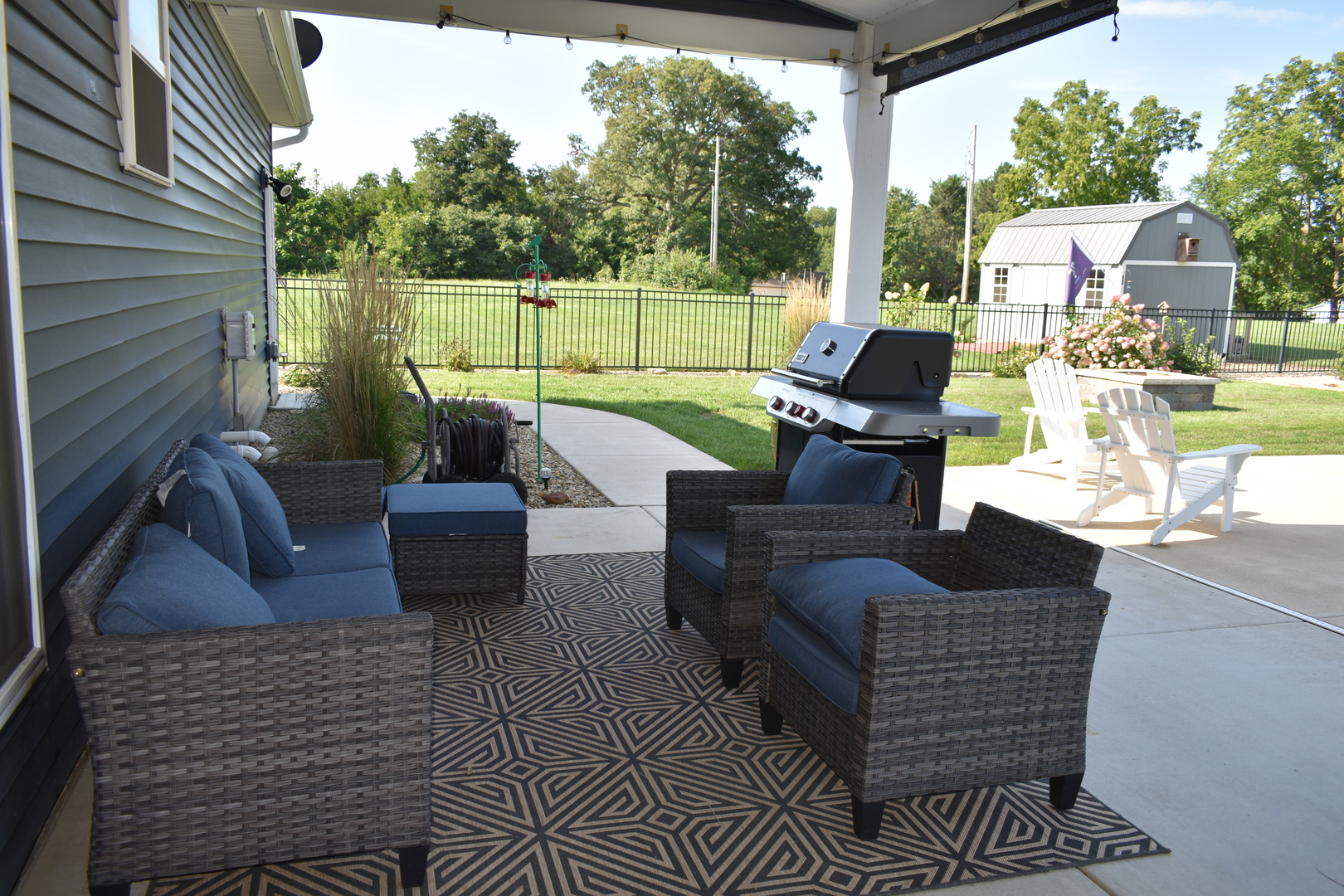 13 Wolf Run Road El Paso, IL 61738 - Photo 4 of 57 a view of a patio with couches chairs and a potted plant