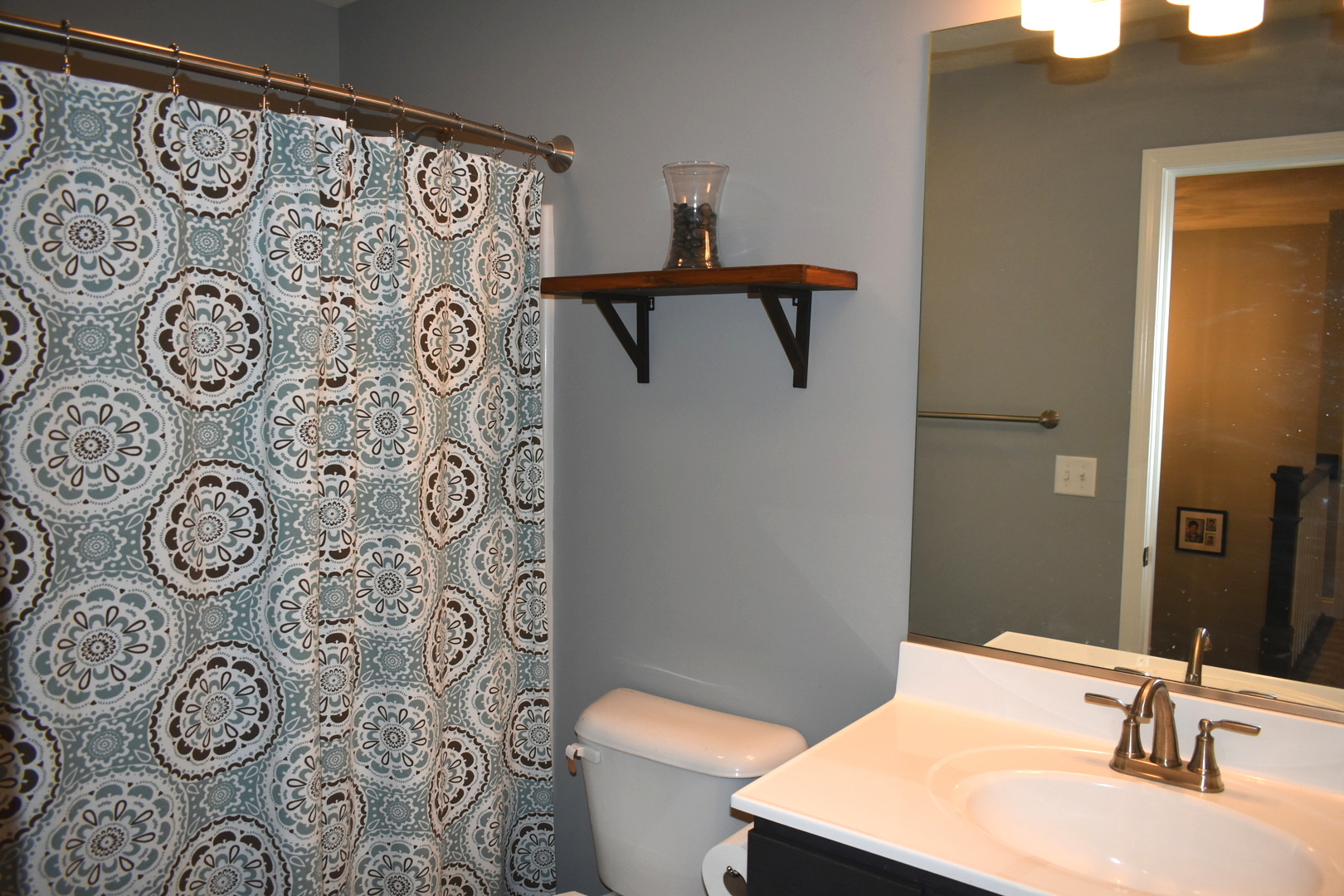 13 Wolf Run Road El Paso, IL 61738 - Photo 41 of 57 a bathroom with a sink and mirror with toilet