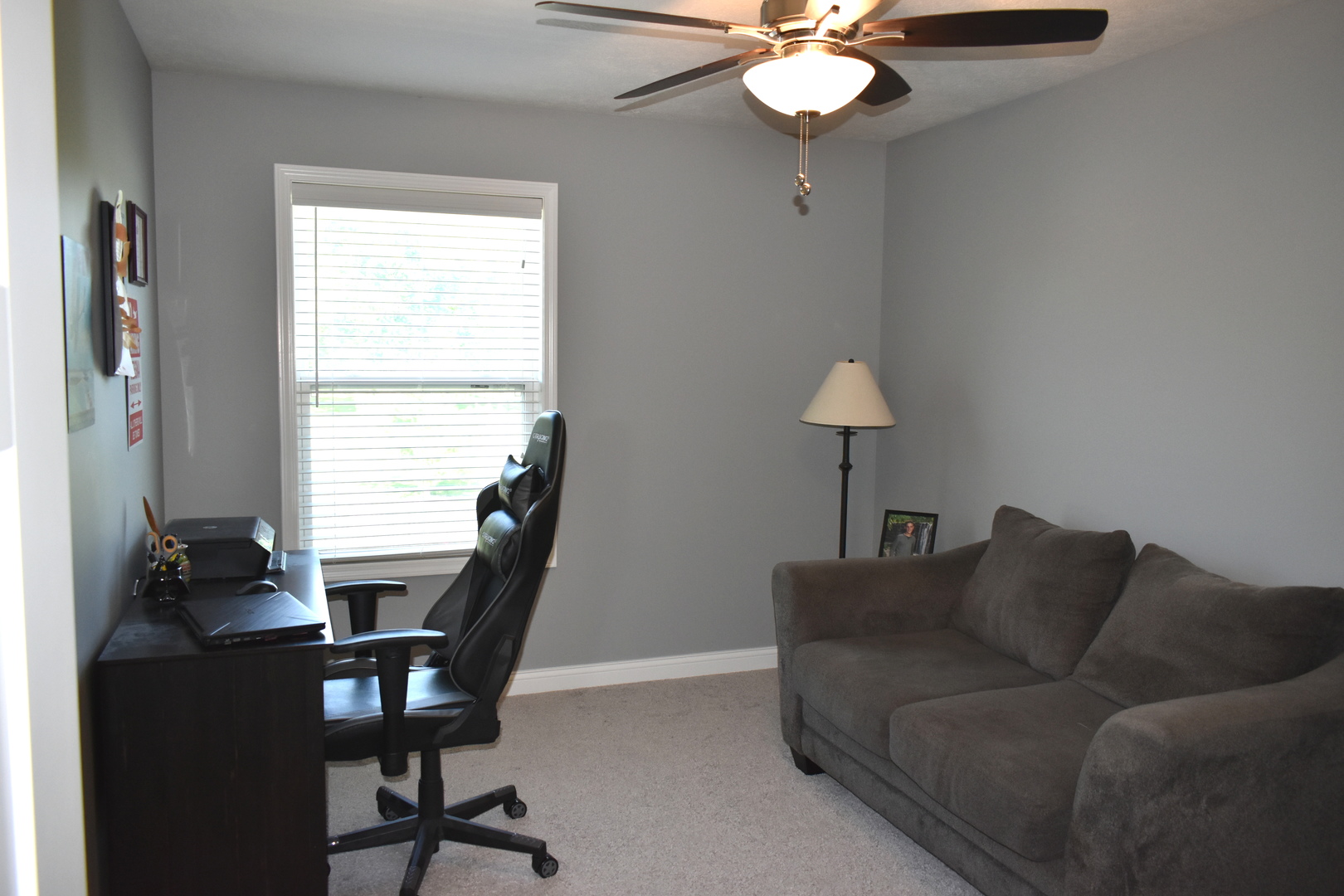 13 Wolf Run Road El Paso, IL 61738 - Photo 42 of 57 a living room with furniture and a window