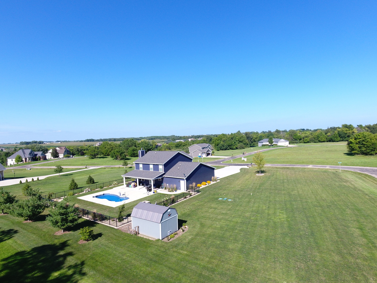 13 Wolf Run Road El Paso, IL 61738 - Photo 55 of 57 a view of a garden with lawn chairs