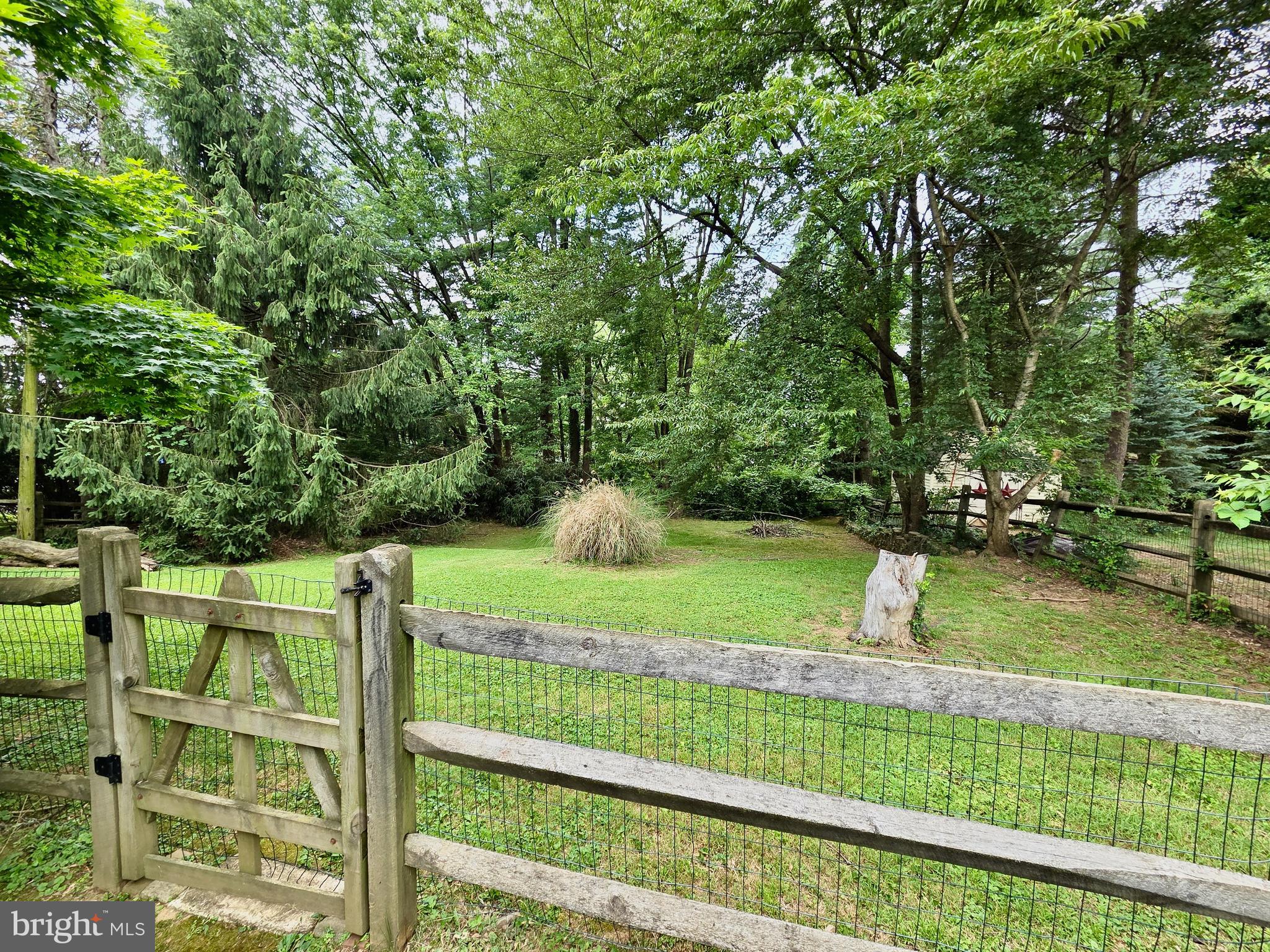 310 Butler Road Springfield, PA 19064 - Photo 35 of 36 Backyard past Pool Fence