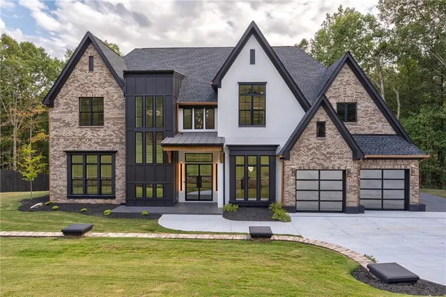 a view of a house with swimming pool and porch