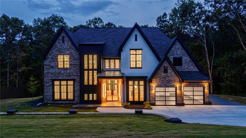 4459 Grady Smith Road Loganville, GA 30052 - Photo 2 of 124 a front view of house with a yard