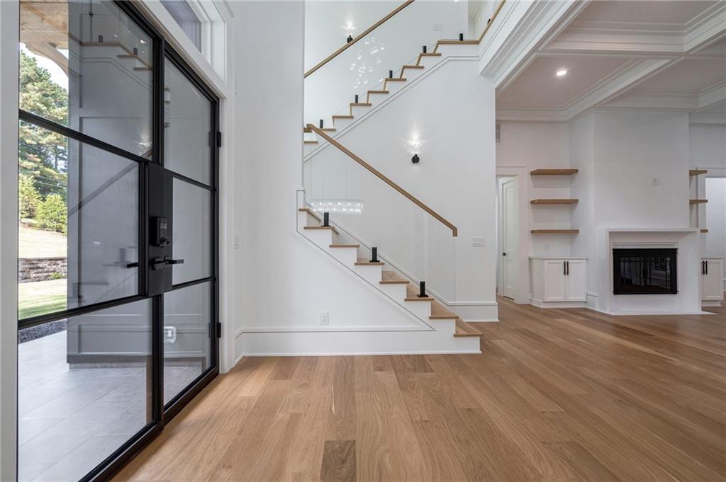 4459 Grady Smith Road Loganville, GA 30052 - Photo 22 of 124 a view of entryway and hall with wooden floor