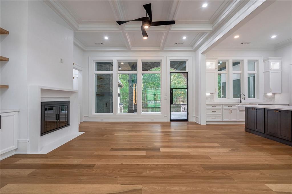 4459 Grady Smith Road Loganville, GA 30052 - Photo 24 of 124 a view of an empty room with window and a kitchen