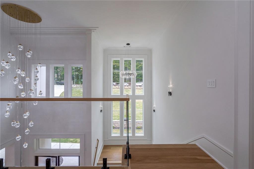 4459 Grady Smith Road Loganville, GA 30052 - Photo 82 of 124 a view of an entryway with wooden floor