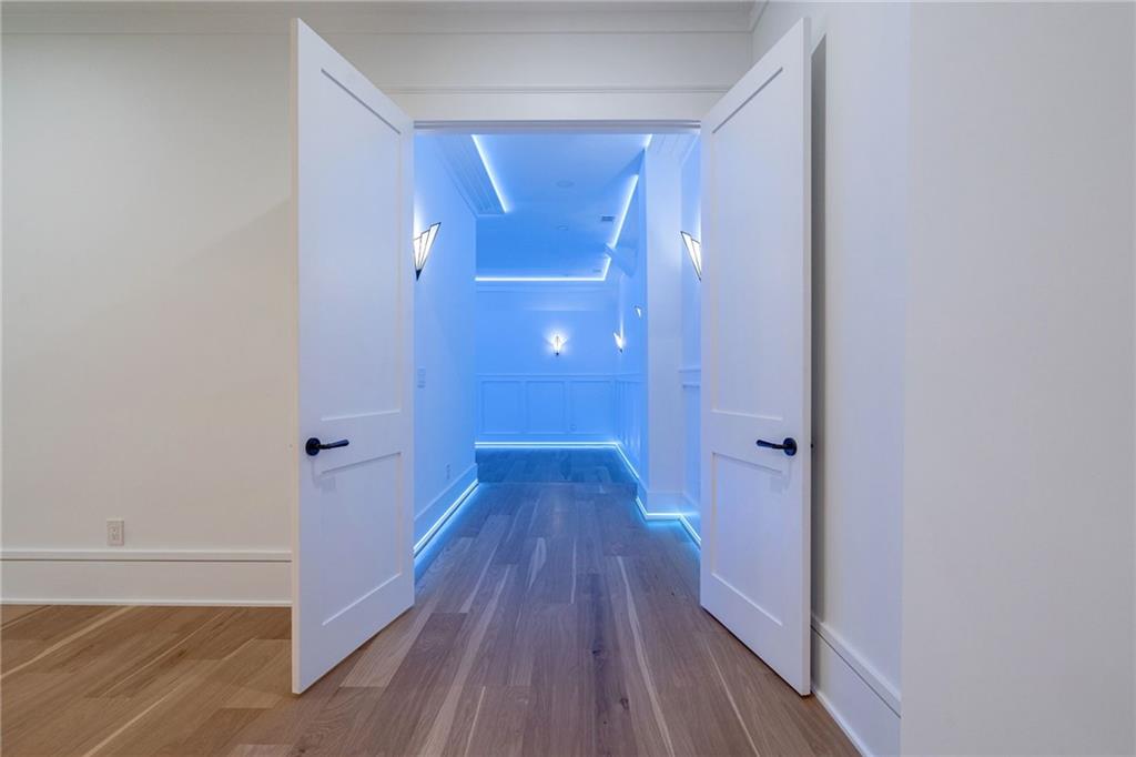 4459 Grady Smith Road Loganville, GA 30052 - Photo 95 of 124 a view of a room with wooden floor
