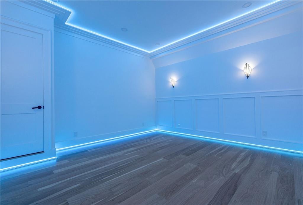 4459 Grady Smith Road Loganville, GA 30052 - Photo 96 of 124 a view of empty room with wooden floor