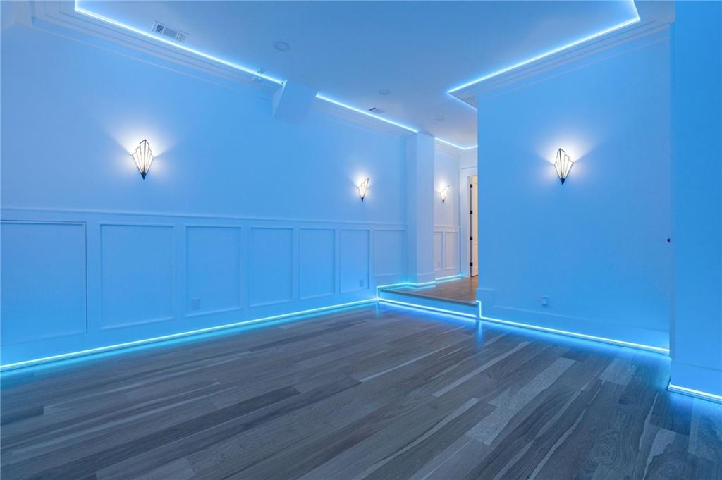 4459 Grady Smith Road Loganville, GA 30052 - Photo 97 of 124 a view of empty room with wooden floor