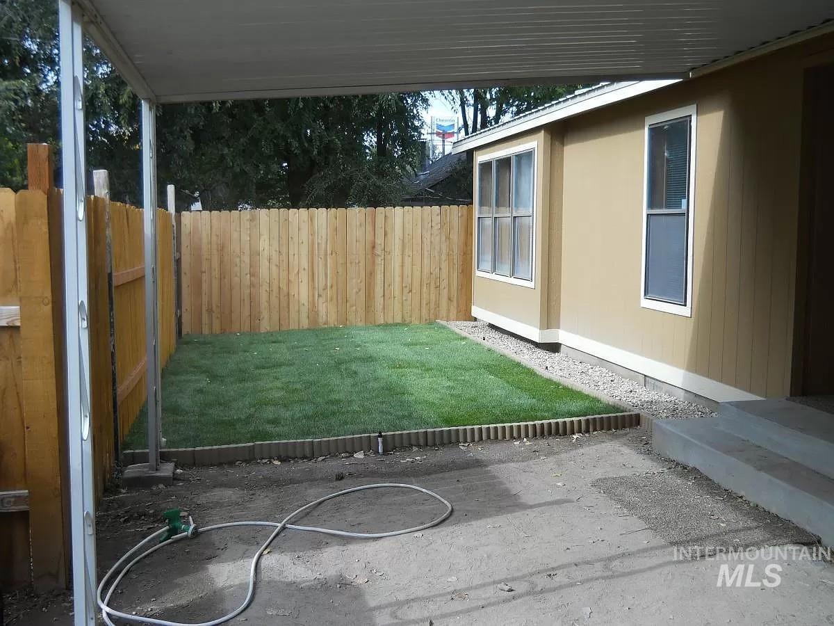 1107 East Elgin Street Caldwell, ID 83605 - Photo 2 of 5 View of fenced backyard
