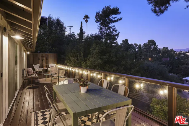 a view of swimming pool with a patio and a yard