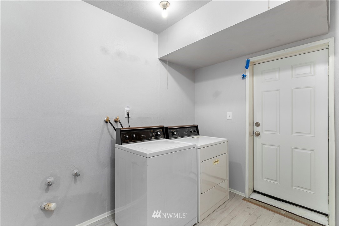 3113 Southeast 18th Street Renton, WA 98058 - Photo 23 of 30 a utility room with dryer and washer