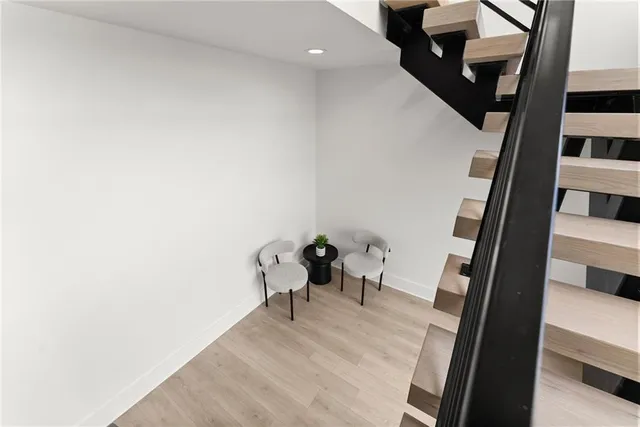 a bathroom with a shower and toilet