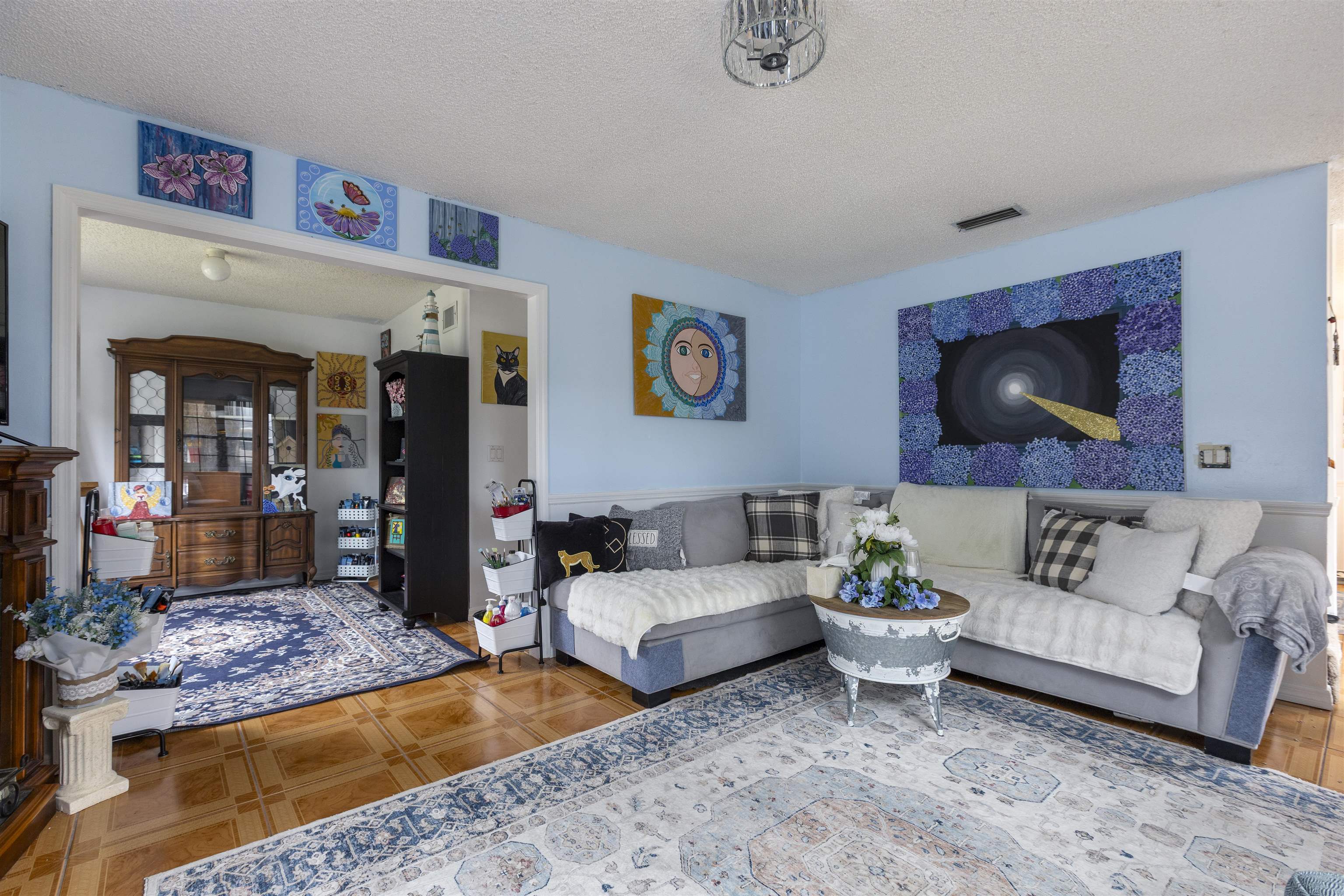 4240 New Hampshire Road Elkton, FL 32033 - Photo 17 of 35 a living room with furniture and a rug