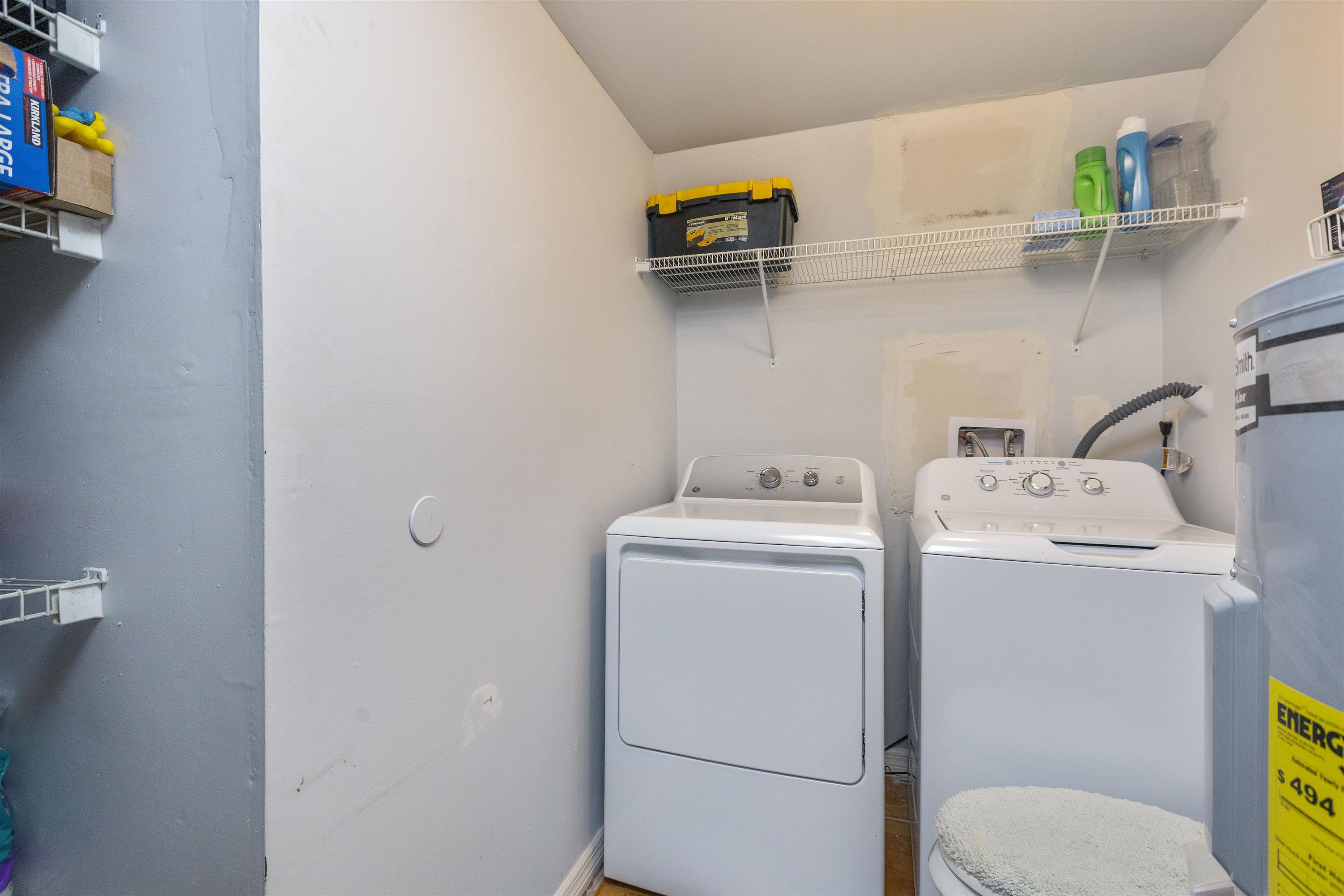 4240 New Hampshire Road Elkton, FL 32033 - Photo 26 of 35 a utility room with dryer and washer