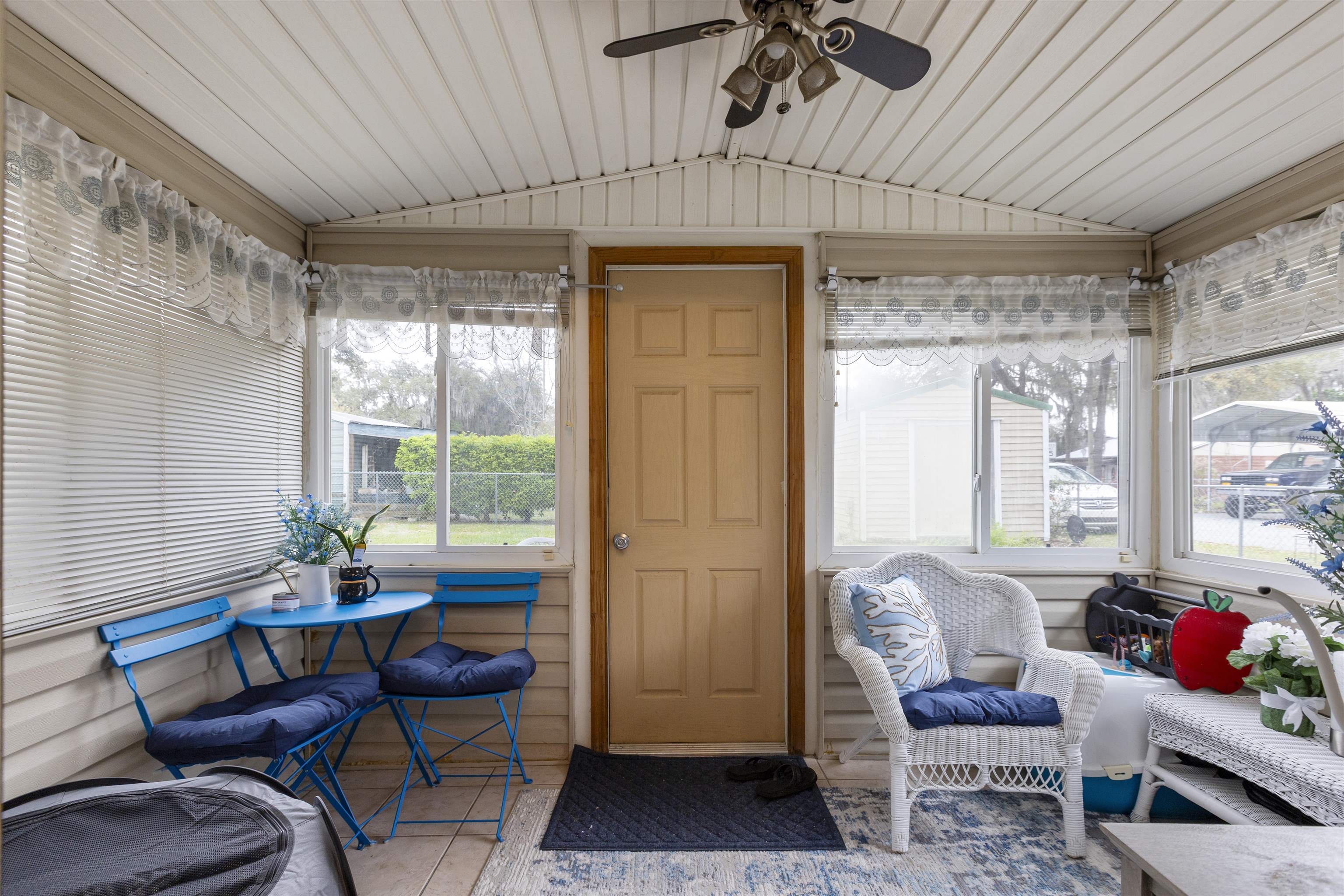 4240 New Hampshire Road Elkton, FL 32033 - Photo 28 of 35 a living room with furniture and a window