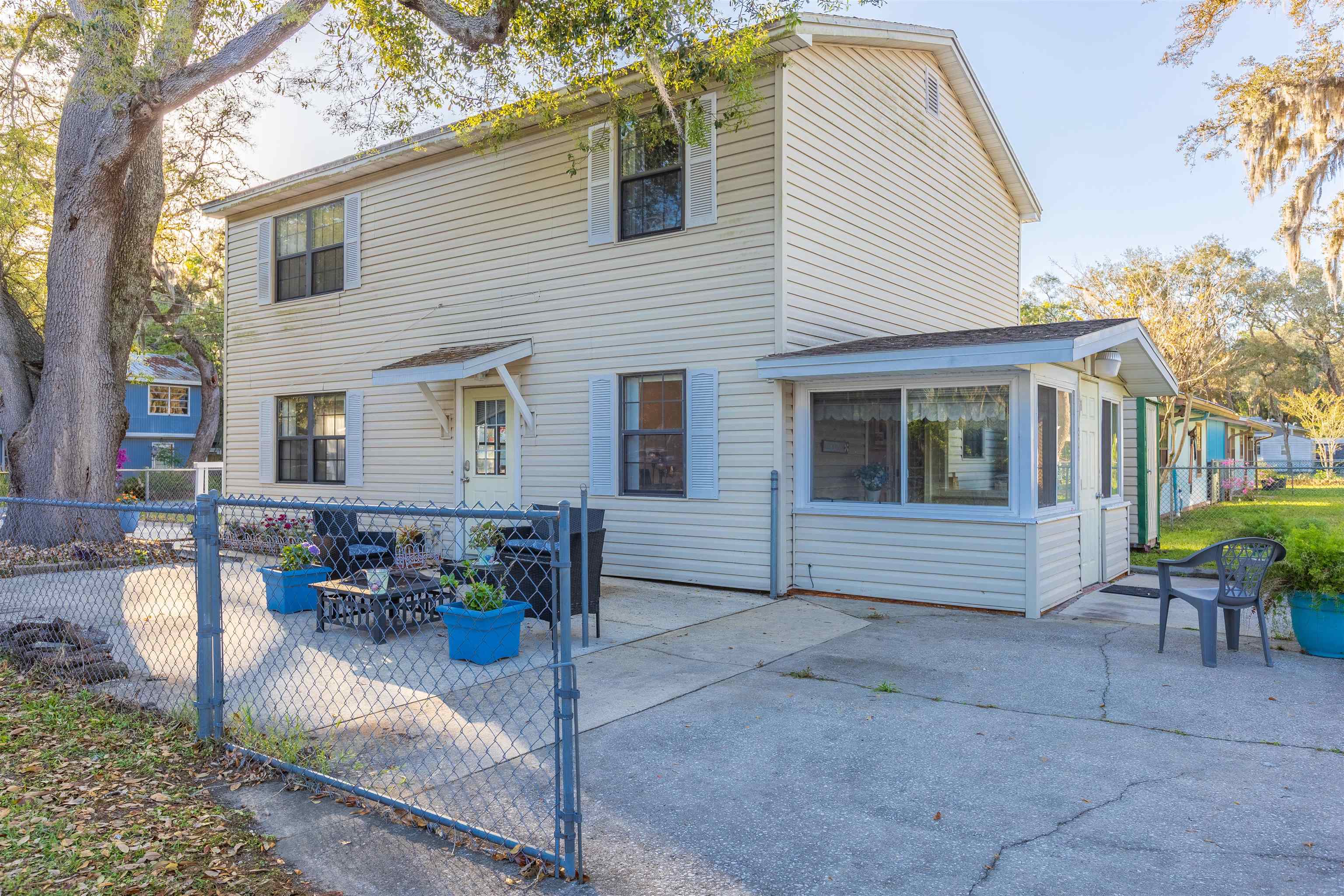 4240 New Hampshire Road Elkton, FL 32033 - Photo 5 of 35 a view of a house with a patio