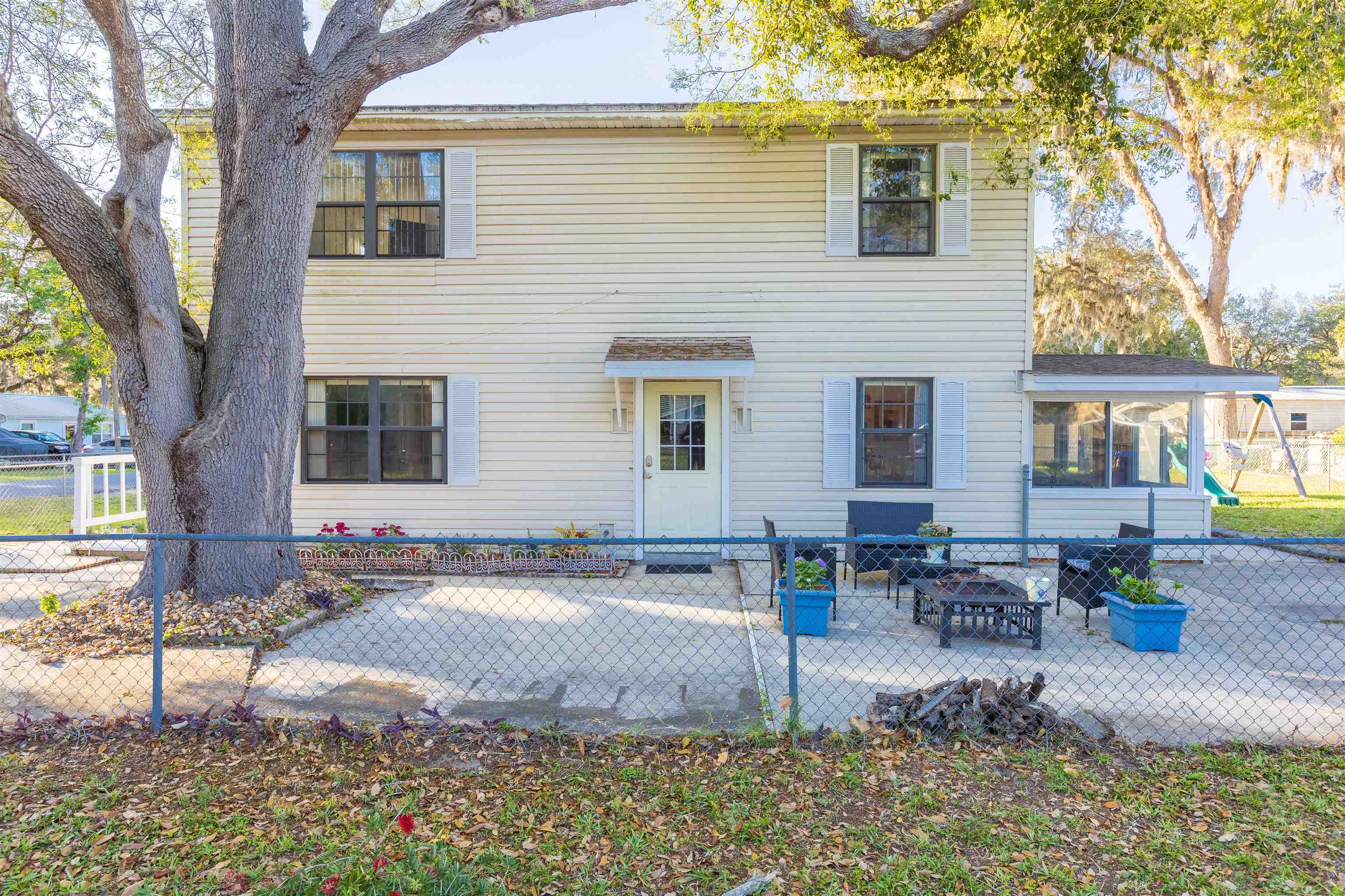 4240 New Hampshire Road Elkton, FL 32033 - Photo 9 of 35 a view of a house with backyard and sitting area