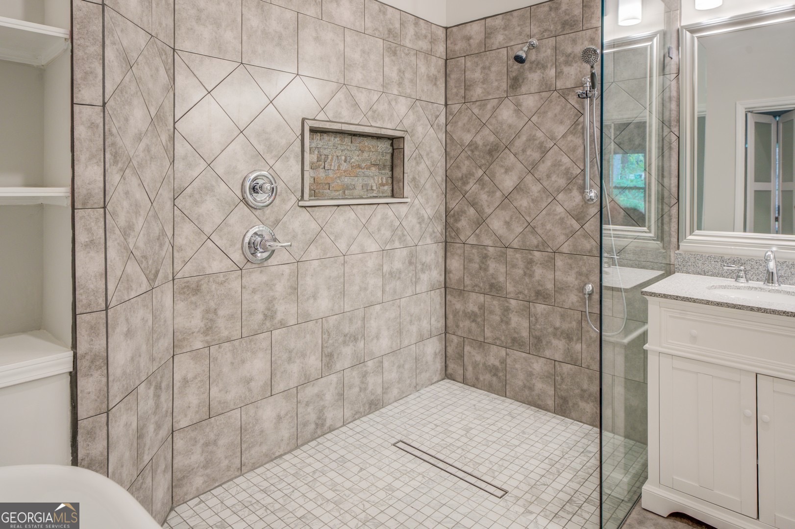 359 Whippoorwill Road Monticello, GA 31064 - Photo 21 of 37 a bathroom with a shower and a sink