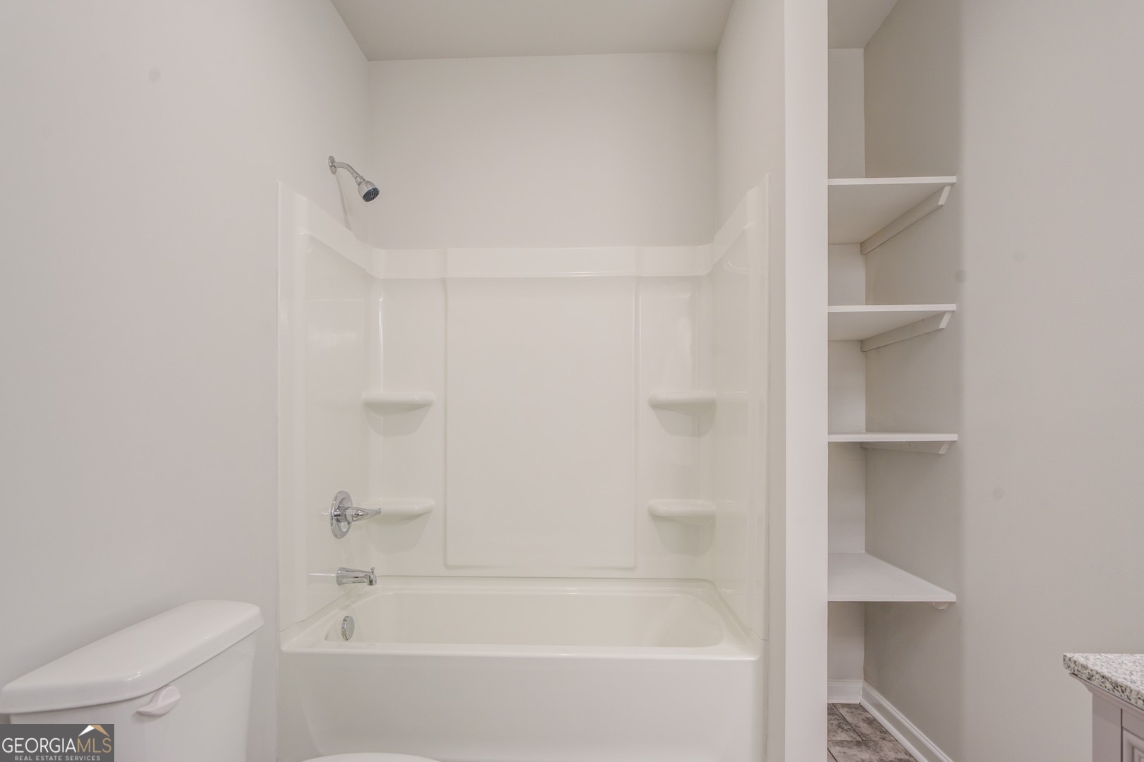 359 Whippoorwill Road Monticello, GA 31064 - Photo 33 of 37 a close up of a bathtub in a bathroom