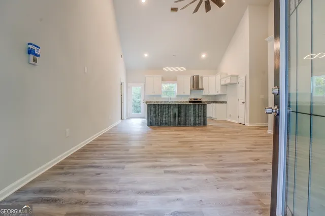 a view of a kitchen and a window