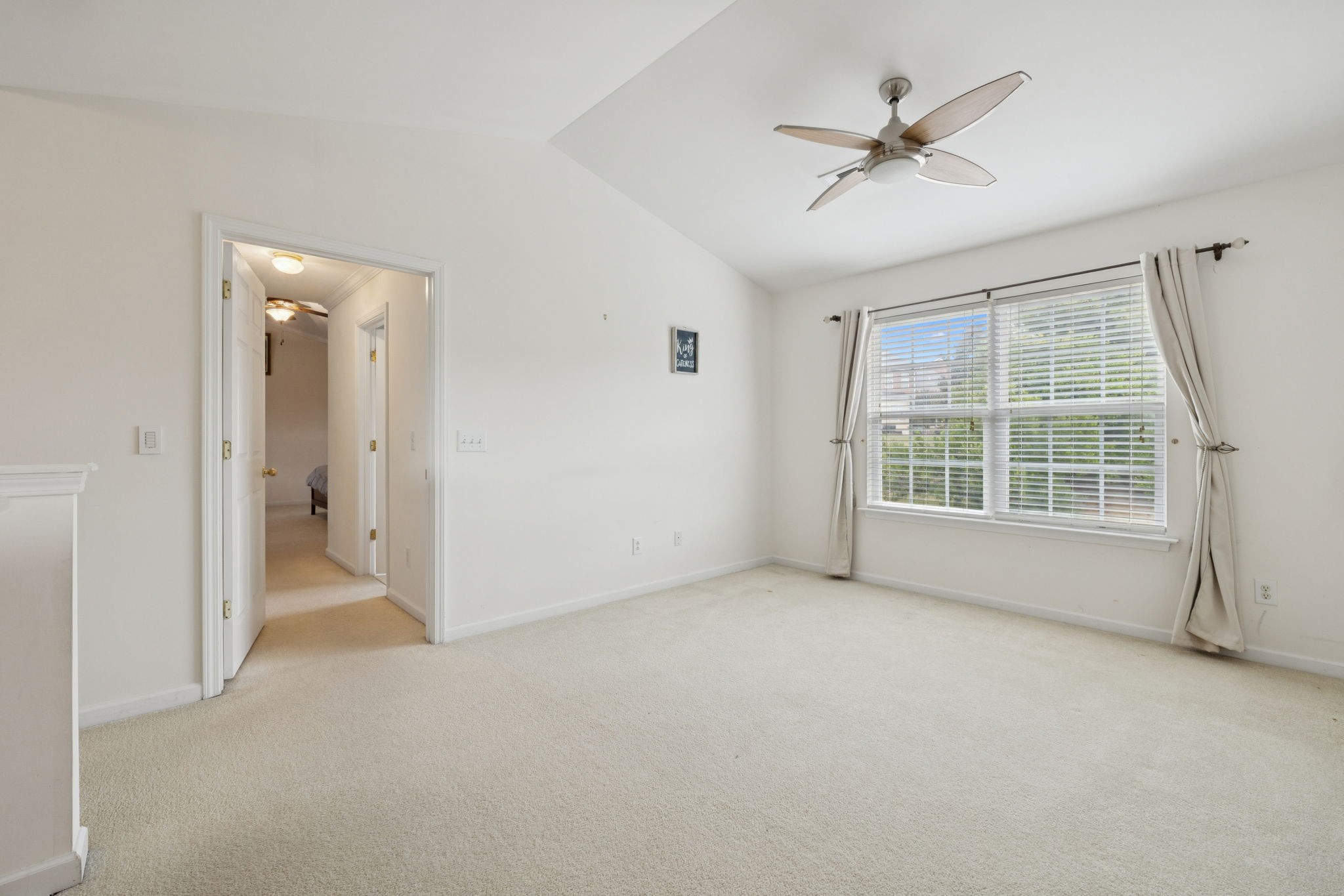 1728 Liberty Pike Franklin, TN 37067 - Photo 26 of 52 an empty room with chandelier fan and windows