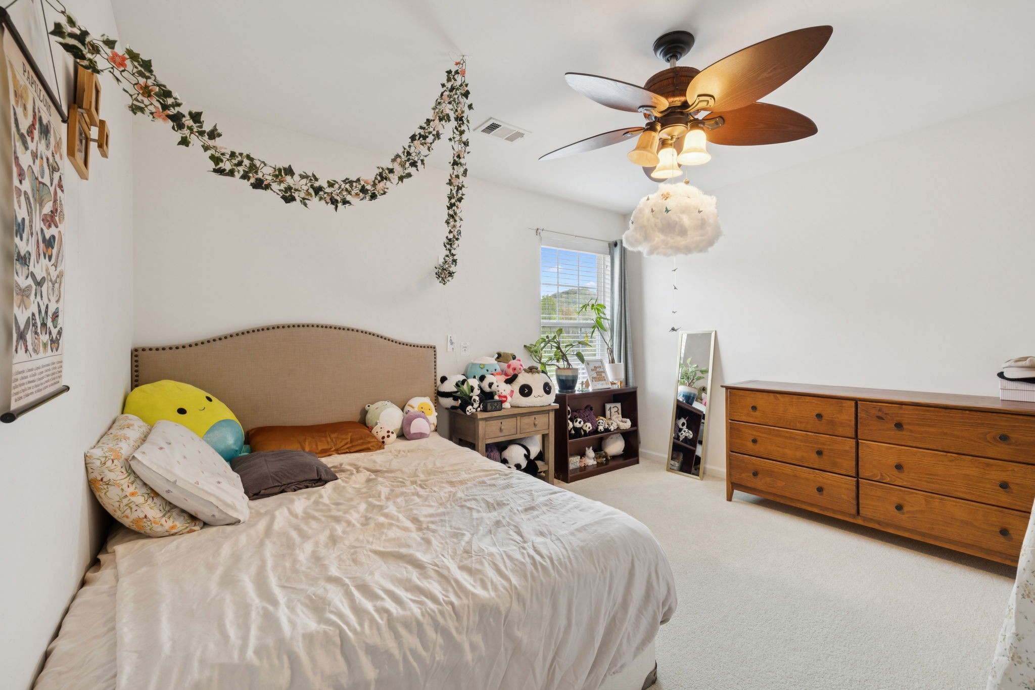 1728 Liberty Pike Franklin, TN 37067 - Photo 31 of 52 a bedroom with a bed and a chandelier