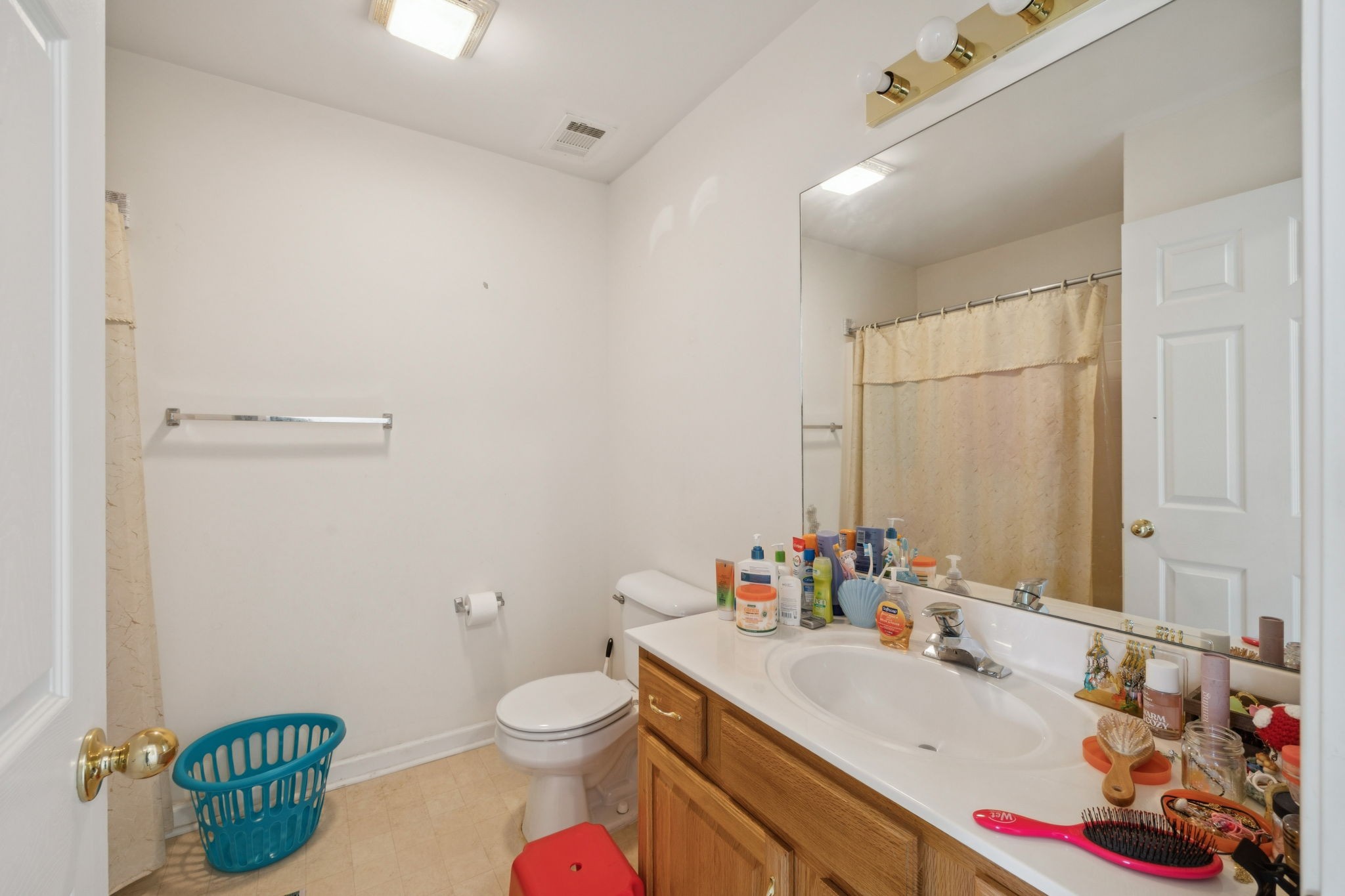 1728 Liberty Pike Franklin, TN 37067 - Photo 32 of 52 a bathroom with a sink toilet and mirror