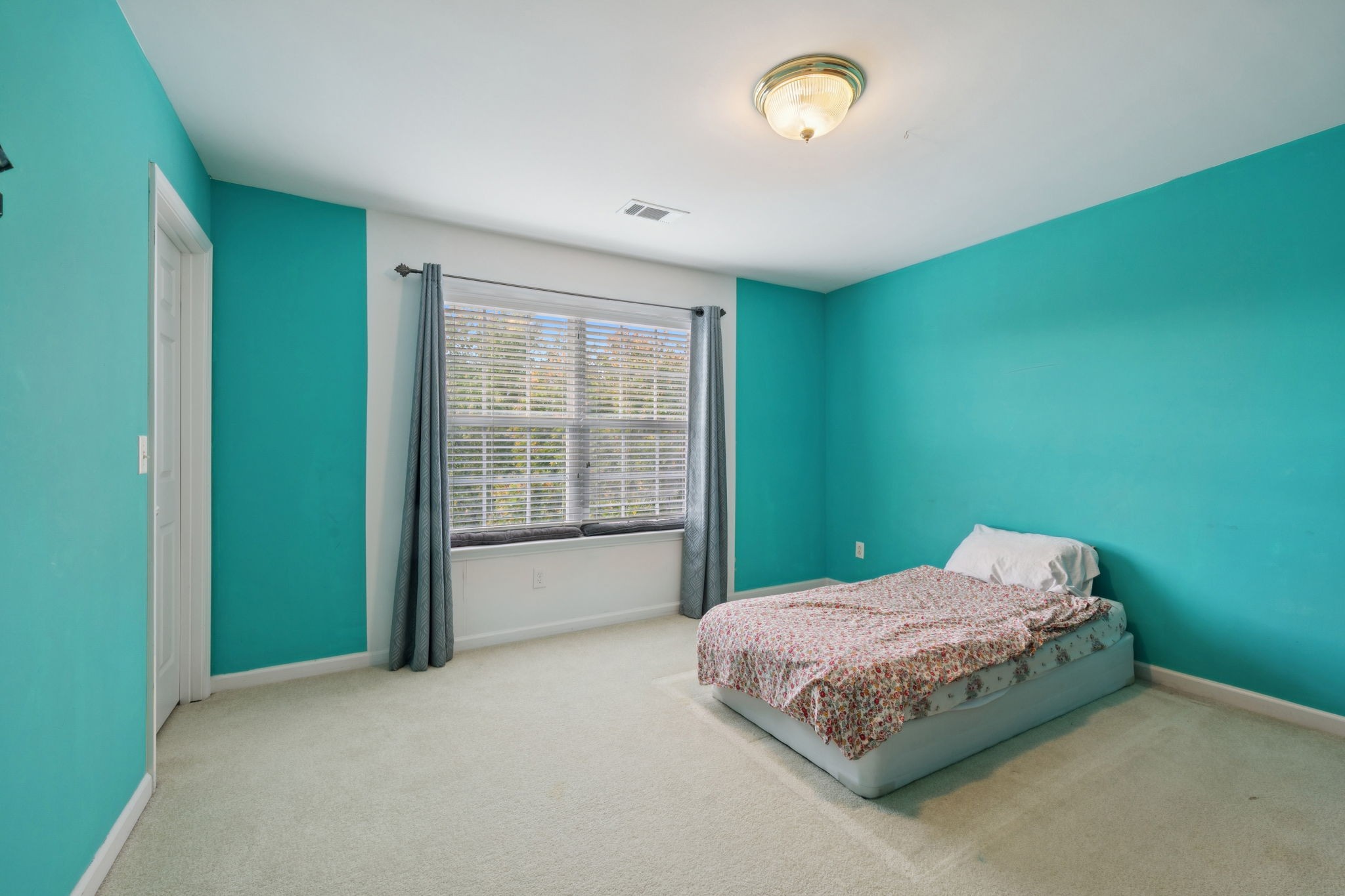 1728 Liberty Pike Franklin, TN 37067 - Photo 34 of 52 a bedroom with a bed and a window