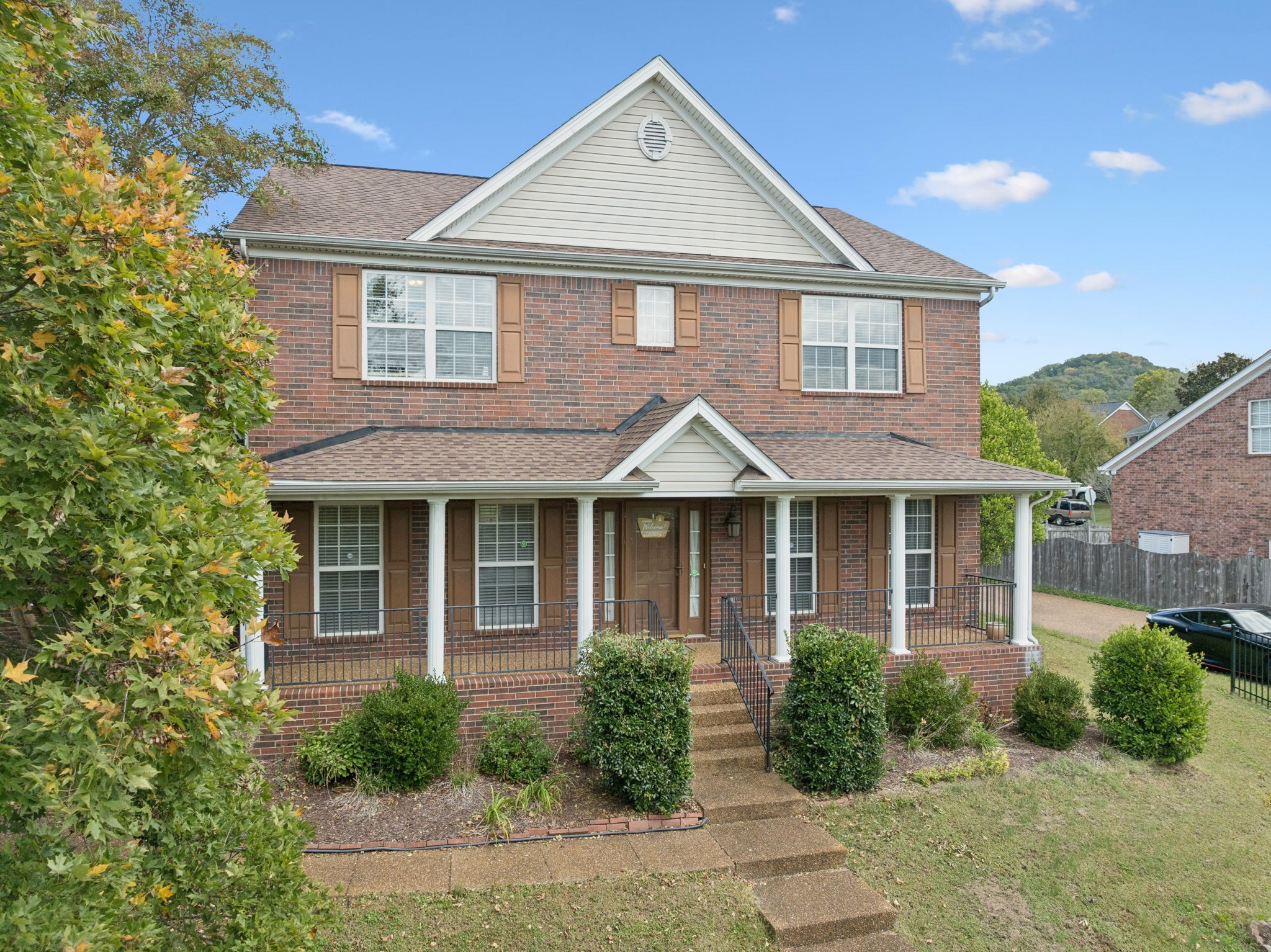1728 Liberty Pike Franklin, TN 37067 - Photo 7 of 52 a front view of a house with garden
