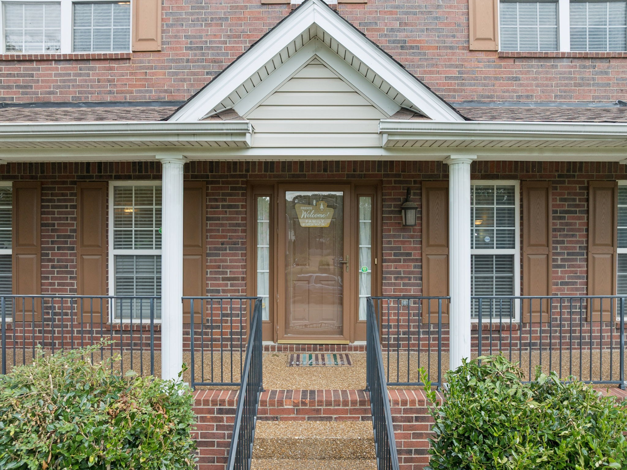 1728 Liberty Pike Franklin, TN 37067 - Photo 8 of 52 a view of a brick house with large windows