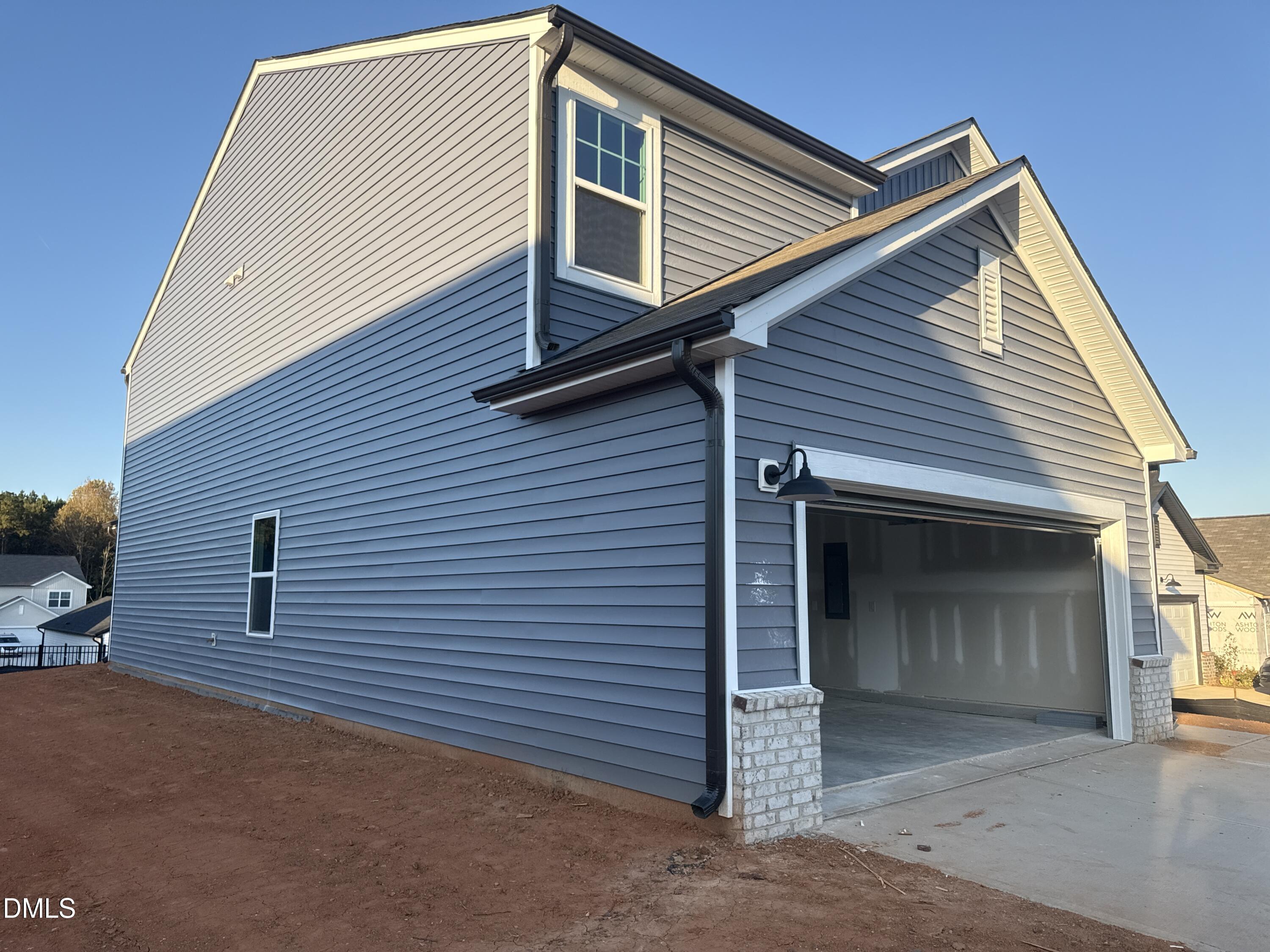 11790 Salers Loop Middlesex, NC 27557 - Photo 23 of 43 a view of a house with a garage