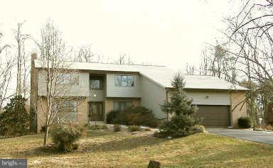 11317 Vale Road Oakton, VA 22124 - Photo 1 of 29 a view of a house with a yard