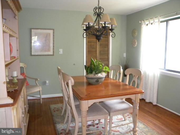 11317 Vale Road Oakton, VA 22124 - Photo 9 of 29 a dining room with furniture and window