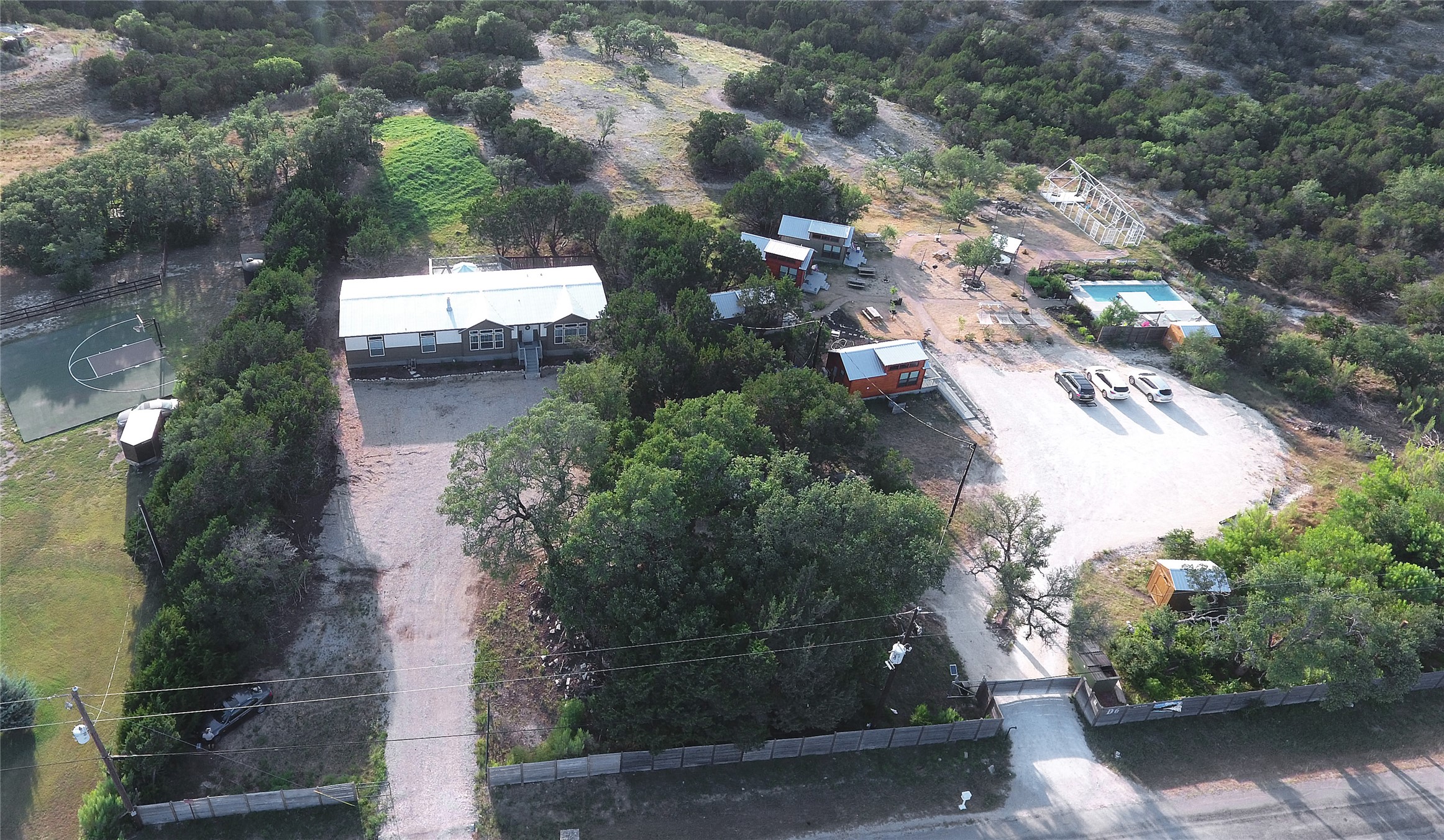 806 Bell Springs Road Dripping Springs, TX 78620 - Photo 17 of 34 an aerial view of a house with a yard