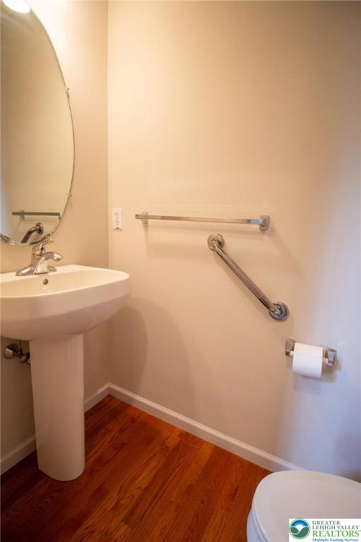 4129 Coleman Street Bethlehem, PA 18020 - Photo 15 of 36 a bathroom with a sink mirror and toilet