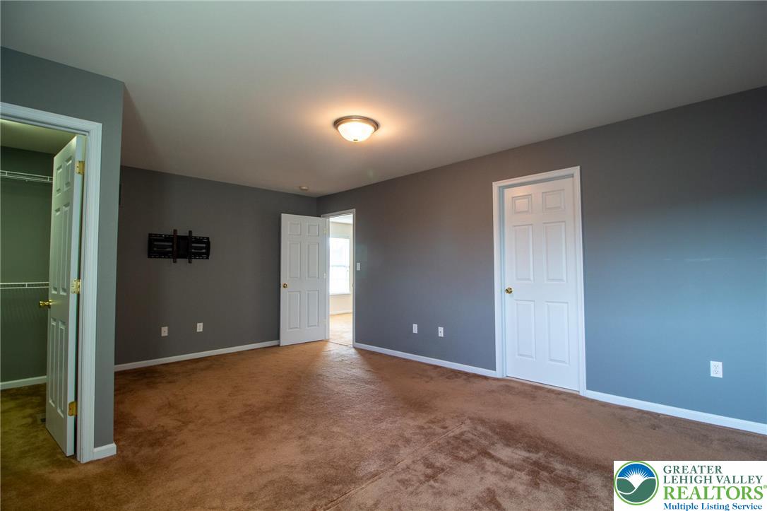 4129 Coleman Street Bethlehem, PA 18020 - Photo 25 of 36 wooden floor and windows in an empty room