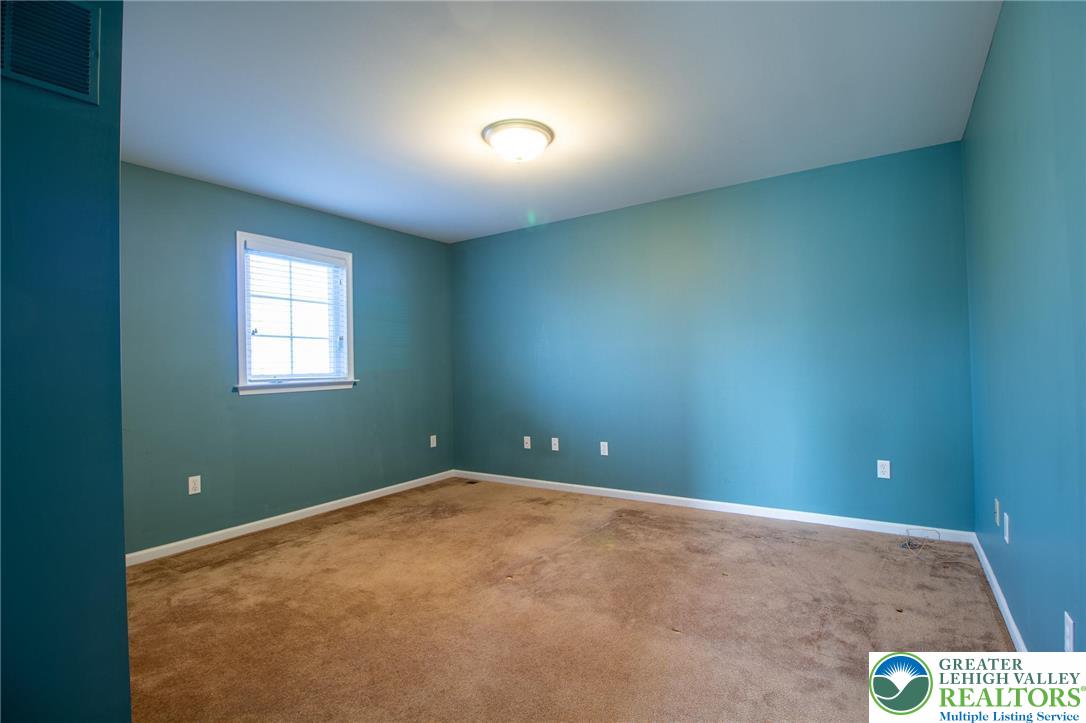 4129 Coleman Street Bethlehem, PA 18020 - Photo 31 of 36 an empty room with windows and closet