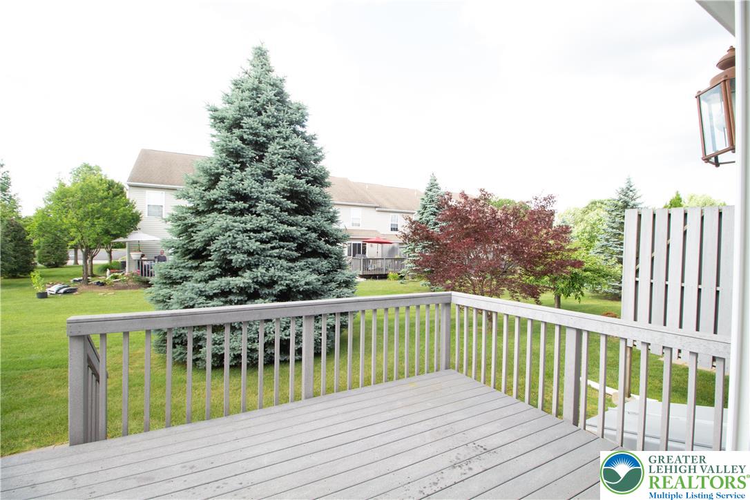 4129 Coleman Street Bethlehem, PA 18020 - Photo 35 of 36 a balcony with wooden floor and fence