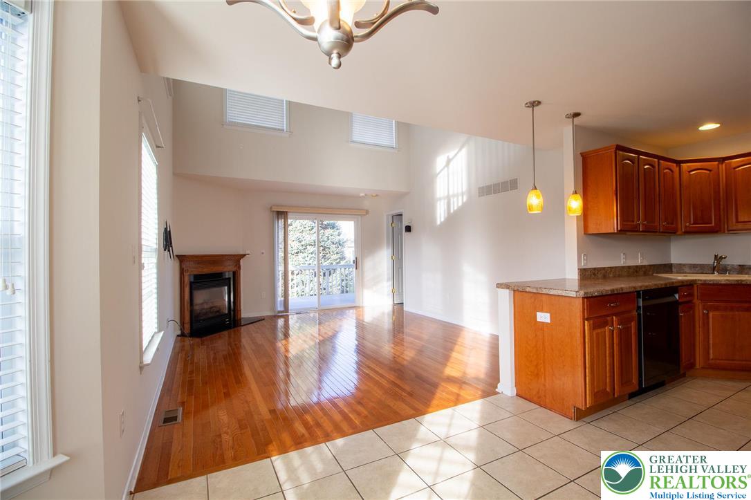 4129 Coleman Street Bethlehem, PA 18020 - Photo 6 of 36 a large kitchen with granite countertop a stove a sink and a refrigerator