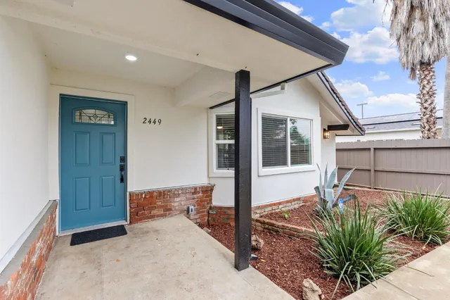 a house view with a outdoor space