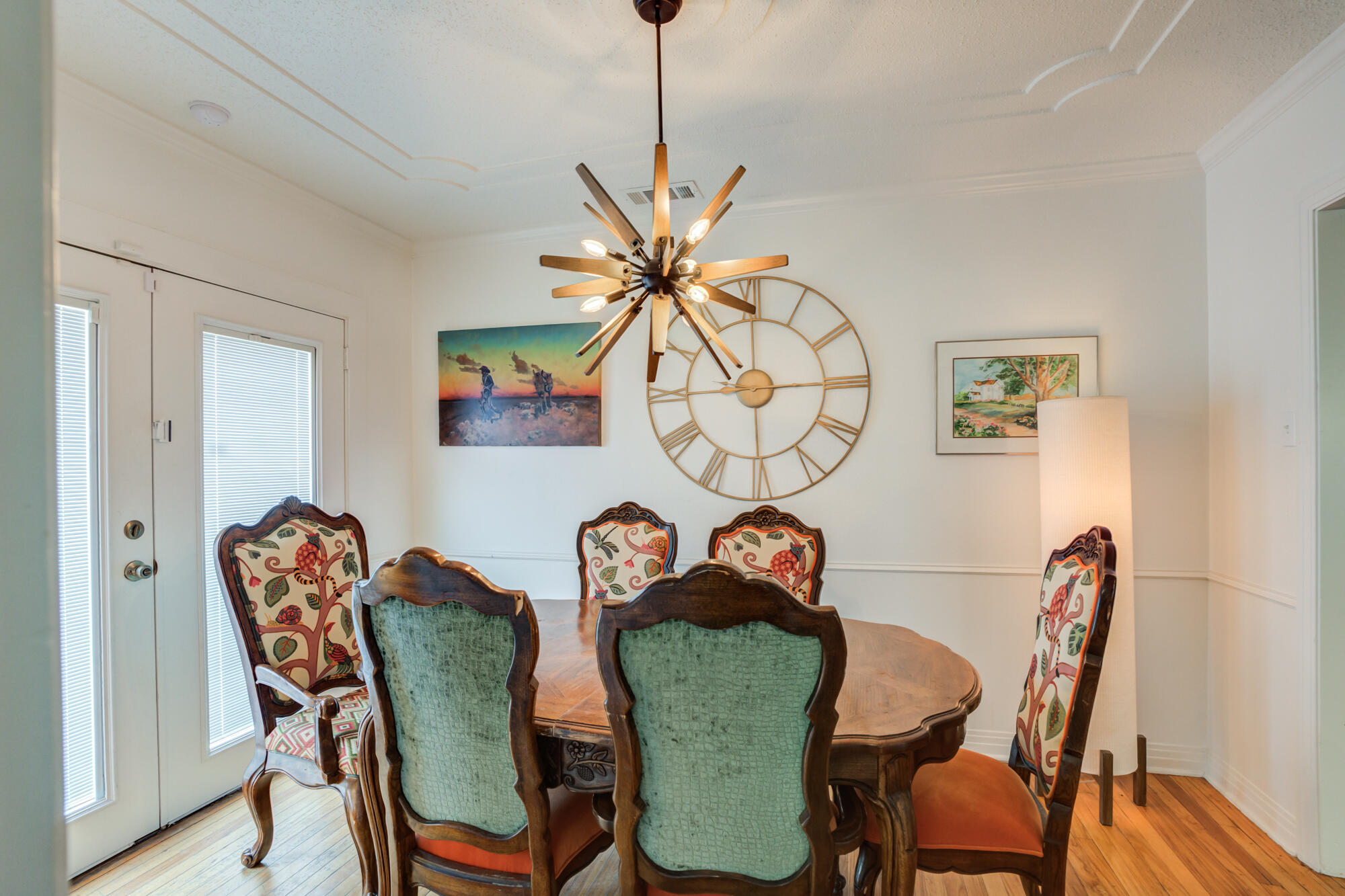 2826 33rd Street Lubbock, TX 79410 - Photo 18 of 33 a dining room with furniture and wooden floor
