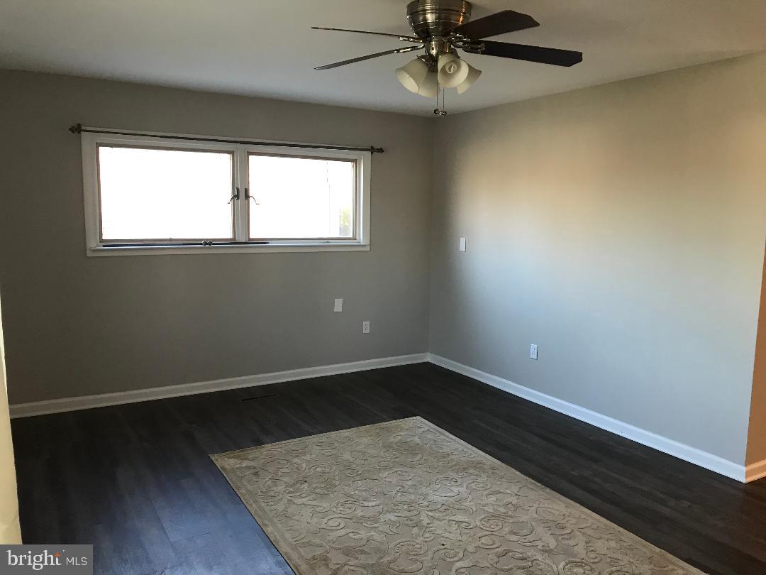 2461 Woodcroft Road Baltimore, MD 21234 - Photo 12 of 33 Front living room, wood floors thru out.
