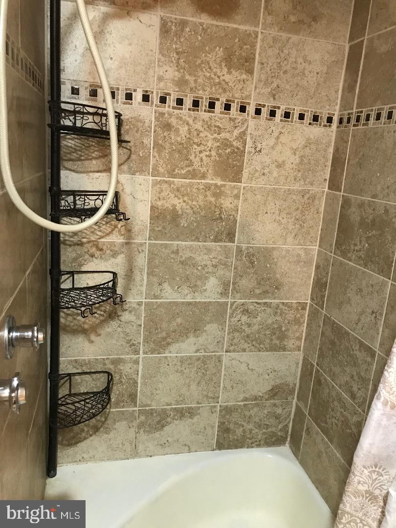 2461 Woodcroft Road Baltimore, MD 21234 - Photo 31 of 33 Walk in shower in lower level bathroom