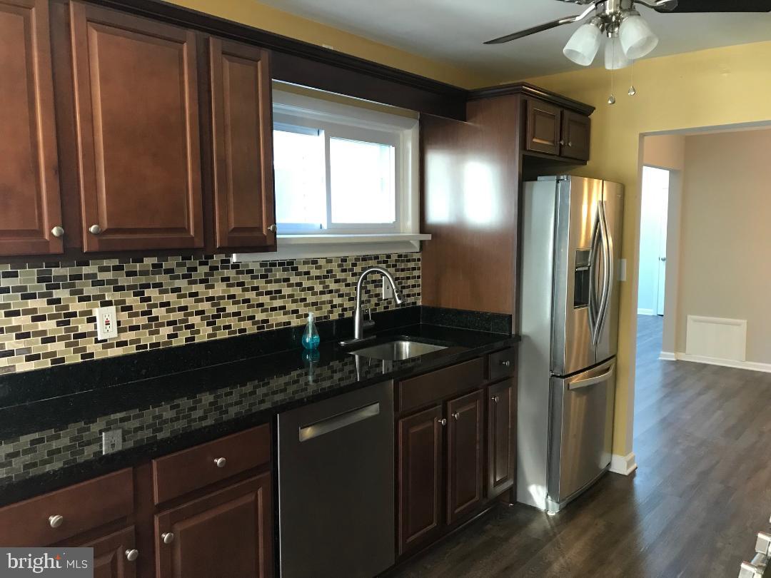 2461 Woodcroft Road Baltimore, MD 21234 - Photo 5 of 33 Gallery kitchen features granite counter tops.