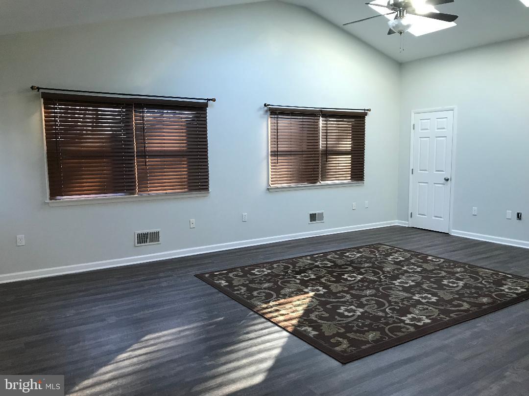 2461 Woodcroft Road Baltimore, MD 21234 - Photo 8 of 33 Large bonus room with cathedral ceilings.