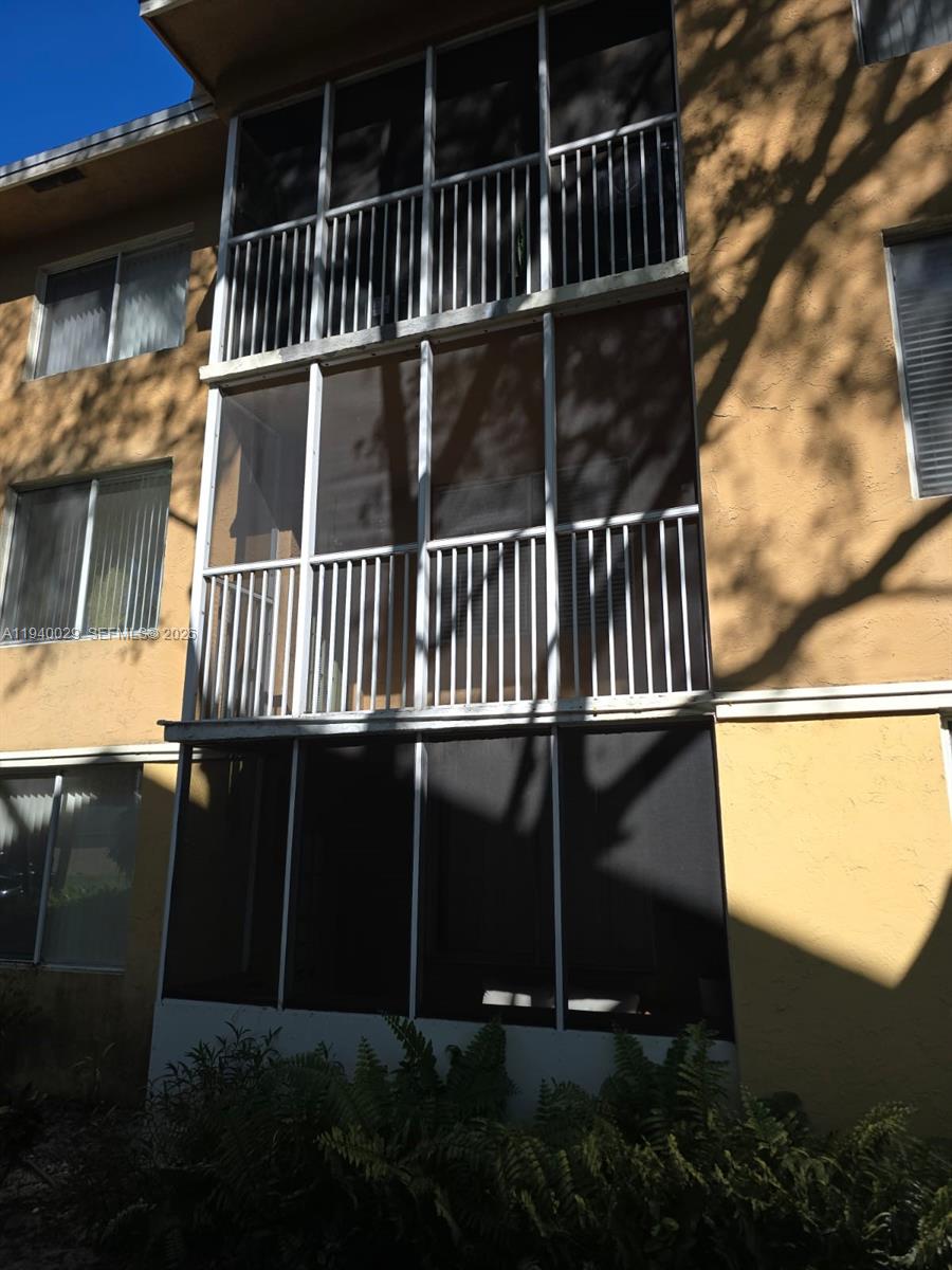 4035 West McNab Road, Unit F210 Pompano Beach, FL 33069 - Photo 21 of 22 a view of balcony