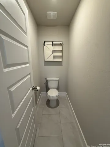 a bathroom with a toilet