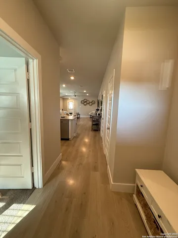 a view of hallway with stairs