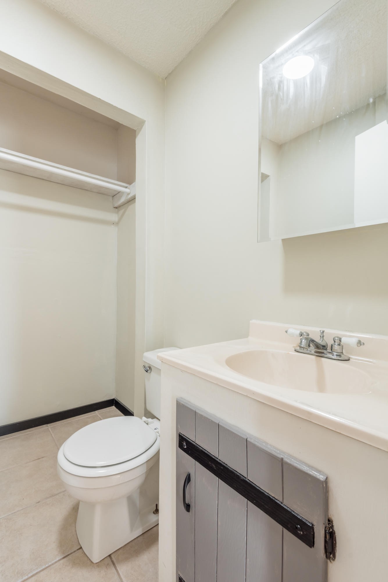 6313 Ridgeview Road Knoxville, TN 37918 - Photo 13 of 33 a bathroom with a sink a toilet and vanity
